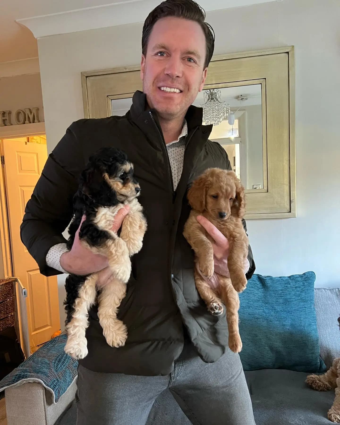 Dr. Tony with puppies in London during a home vet visit